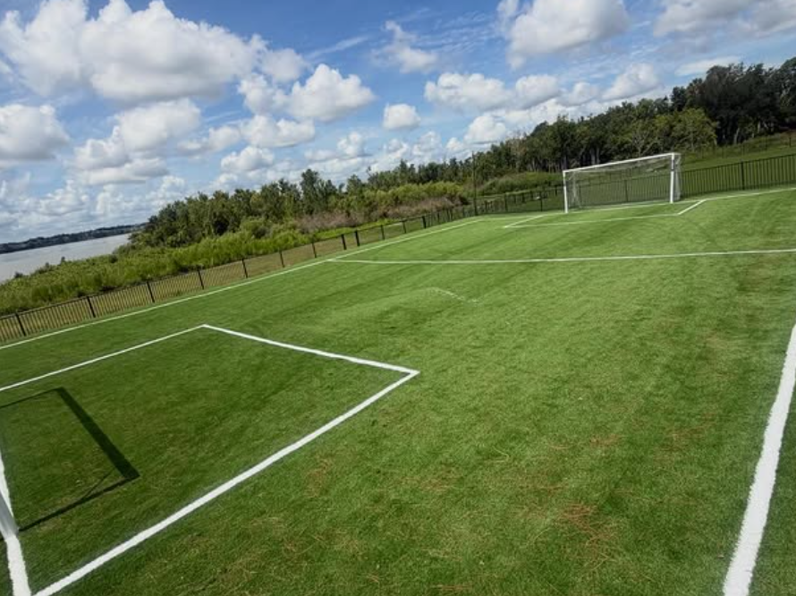 Lakeside sports field after synthetic turf installation